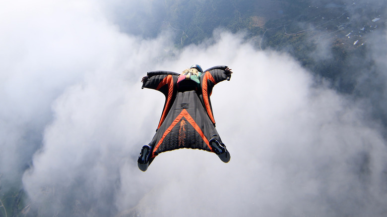 Man in wingsuit diving to earth