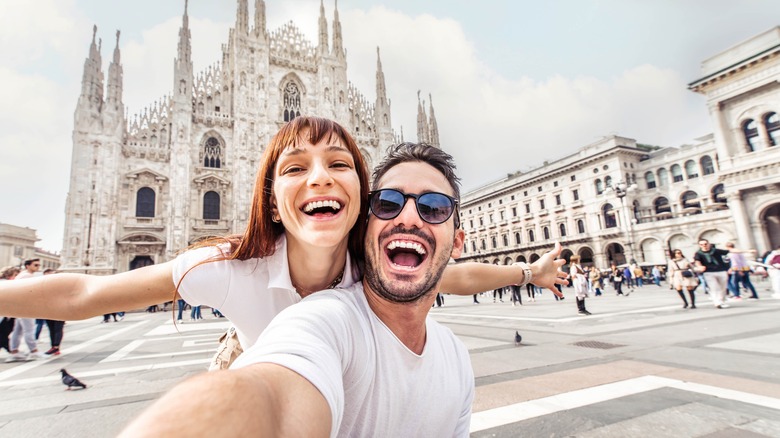 couple selfie in front of church