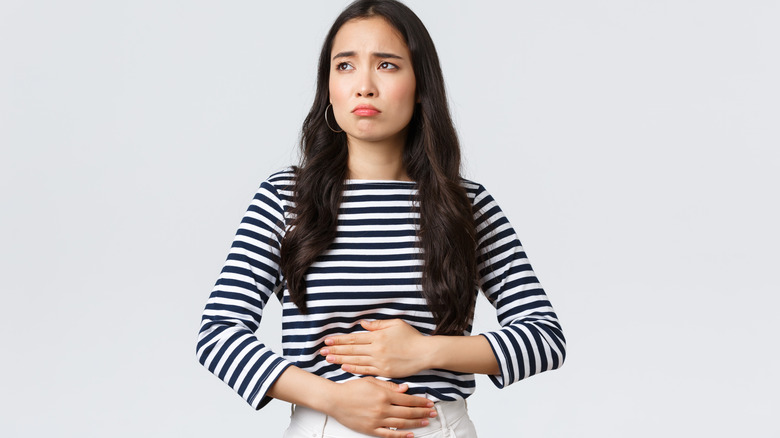 Girl with upset stomach