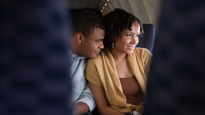 couple on plane