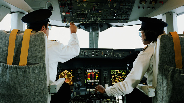 pilots in cockpit